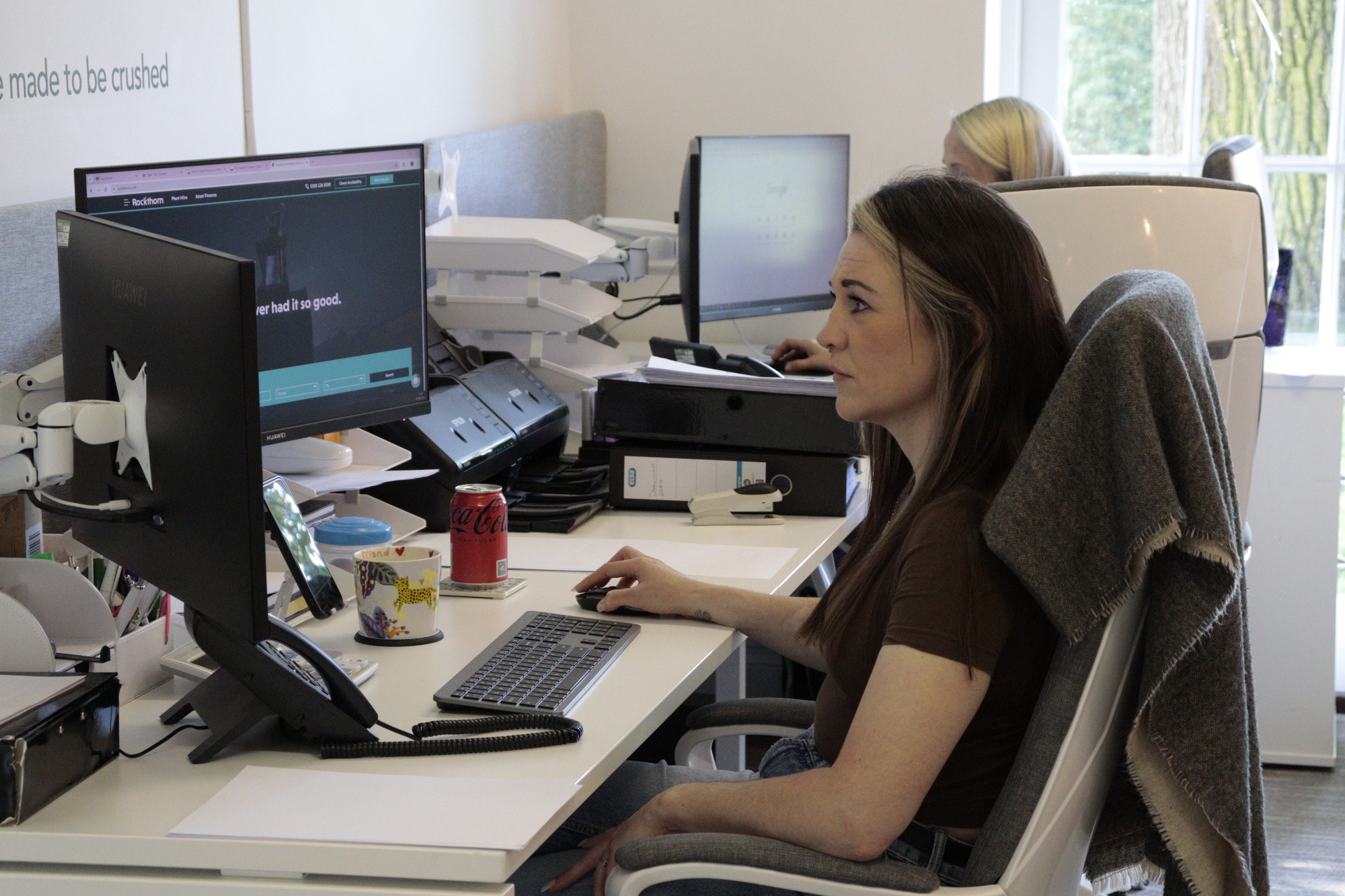 Brunette female working at computer